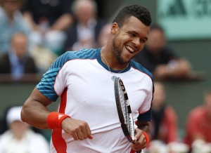 France's Jo-Wilfried Tsonga reacts after